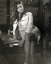 Barbara Hershey sits on desk shwoing legs Liberation of L.B. Jones 8x10 photo