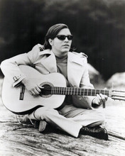 Jose Feliciano seated pose 1960's era holding his guitar 8x10 inch photo