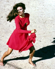 Raquel Welch running in classic red dress from Fathom 8x10 inch real photo