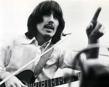 George Harrison 1970 with his guitar in concert 8x10 inch photo