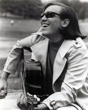 Jose Feliciano smiling 1960's era strumming his guitar 8x10 inch photo