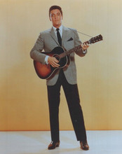 Elvis Presley looks dapper in suit with guitar vintage 8x10 inch photo