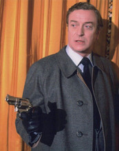 Michael Caine in overcoat pointing gun 1983 The Jigsaw Man 8x10 inch photo