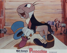 Walt Disney's Pinocchio 8x10 inch photo Jiminy Cricket does song and dance