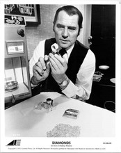 Diamonds 1975 8x10 inch photo Robert Shaw looks at diamonds