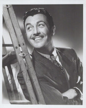 Robert Taylor vintage 8x10 inch photo dashing pose with fasimilie autograph