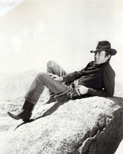 Gregory Peck smiling pose on rock 1958 western The Bravados 8x10 inch photo