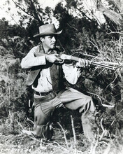 Jack Lemmon kneels in sagebrush aiming his rifle 1958 Cowboy 8x10 inch photo
