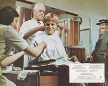 The Sting 1974 Paul Newman watches as Robert Redford gets hair cut 8x10 photo