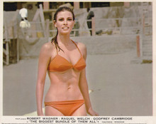 Raquel Welch with wet hair in orange bikini The Biggest Bundle 8x10 inch photo