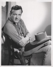 James Arness seated wearing his Colt Peacemaker Gunsmoke 8x10 inch photo