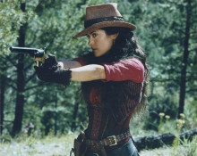 Salma Hayak in western wear aiming gun vintage 8x10 inch photo