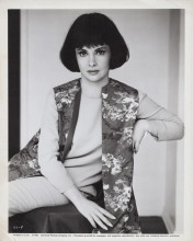 Gina Lollobridiga original 8x10 inch photo floral vest in chair 1965