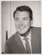 Rock Hudson gives his classic handsome smile 7x9 inch photo