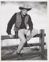 James Arness iconic Marshall Matt Dillon sits on fence Gunsmoke 7x9 inch photo
