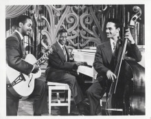 Nat King Cole vintage 8x10 inch photo playing with his band