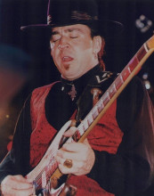 Stevie Ray Vaughan vintage 8x10 inch photo playing guitar in concert