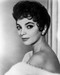 This is an image of Photograph & Poster of Joan Collins 102816