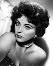 This is an image of Photograph & Poster of Joan Collins 102858