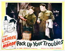 This is an image of Vintage Reproduction Lobby Card of Pack Up Your Troubles 296248