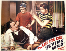 This is an image of Vintage Reproduction Lobby Card of Flying Wild 296447