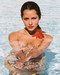 This is an image of 2550 Barbara Carrera Photograph & Poster