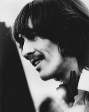 This is an image of Photograph & Poster of George Harrison 101862