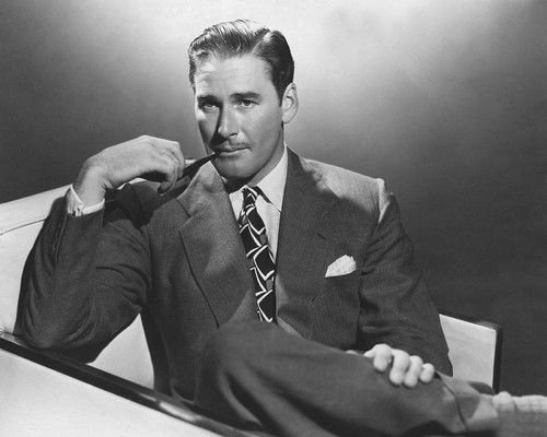 This is an image of Photograph & Poster of Errol Flynn 102615