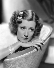 This is an image of Photograph & Poster of Irene Dunne 102739