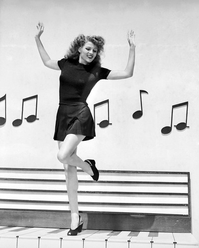 This is an image of Photograph & Poster of Rita Hayworth 102740