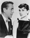 This is an image of 165622 Audrey Hepburn & Humphrey Bogart Photograph & Poster
