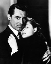 This is an image of 167207 Cary Grant & Ingrid Bergman Photograph & Poster