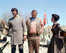 This is an image of 256093 John Wayne, Rock Hudson and Lee Meriwether Photograph & Poster