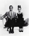 This is an image of 190689 Audrey Hepburn and George Peppard Photograph & Poster