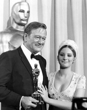 This is an image of 192417 John Wayne and Barbra Streisand Photograph & Poster