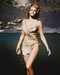 This is an image of 212564 Raquel Welch Photograph & Poster