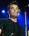 This is an image of 255576 Robbie Williams Photograph & Poster