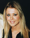 This is an image of 243086 Tara Reid Photograph & Poster