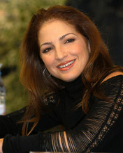 This is an image of 257575 Gloria Estefan Photograph & Poster