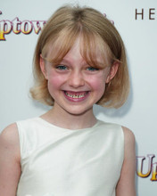 This is an image of 259002 Dakota Fanning Photograph & Poster