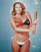 This is an image of 264729 Raquel Welch Photograph & Poster