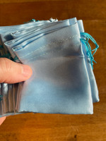 Pale blue satin pouch (118188)