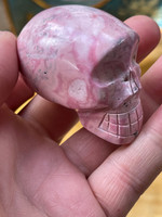 Rhodonite skull (119414)