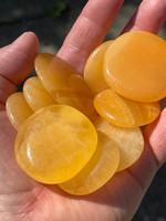 Orange Calcite palmstones (1114894)