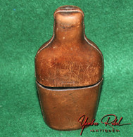Leather covered Whiskey Flask, partially identified  