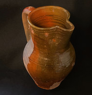 18th century redware pitcher, as in Williamsburg Museum