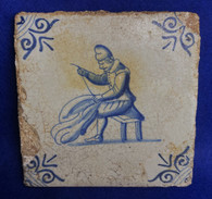 RARE - 17th-century Dutch tile with a tailor sewing a garment, circa 1610 –1660
