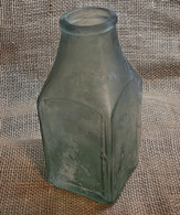 Civil War Cathedral bottle, recovered at Petersburg, as recovered from the USS Monitor