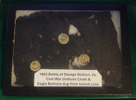 Remnants of a Union soldier’s jacket with buttons recovered from the Savage’s  Station, VA Battlefield
