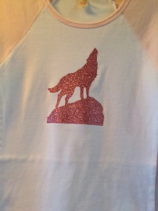 Howling Wolf In Glitter Vinyl on a solid color crew neck tee (not as shown)